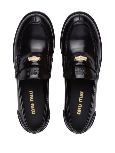 farfetch miumiu loafers.